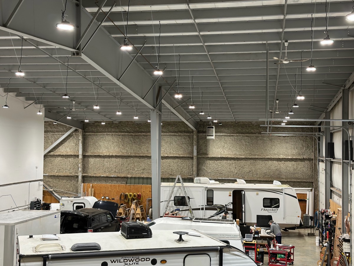 LED high-bay lighting over an RV showroom.